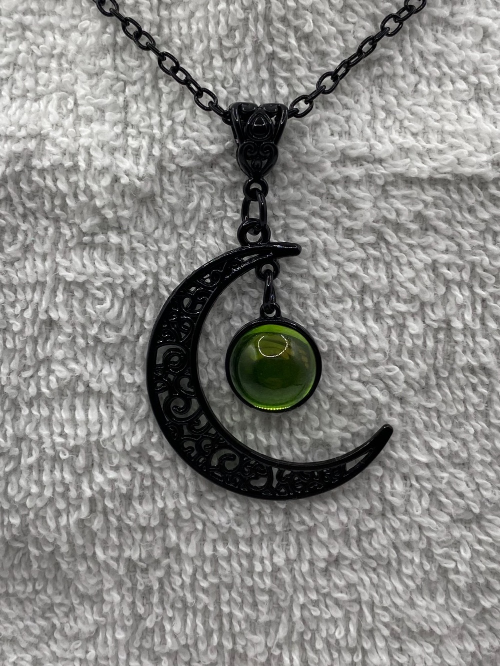 Black Crescent Moon Necklace with Green Glass Pendant